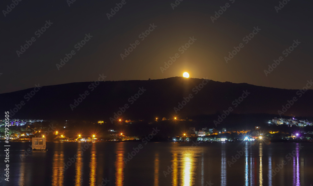 Dikili - İzmir - Turkey Moonrise and light reflections in the sea