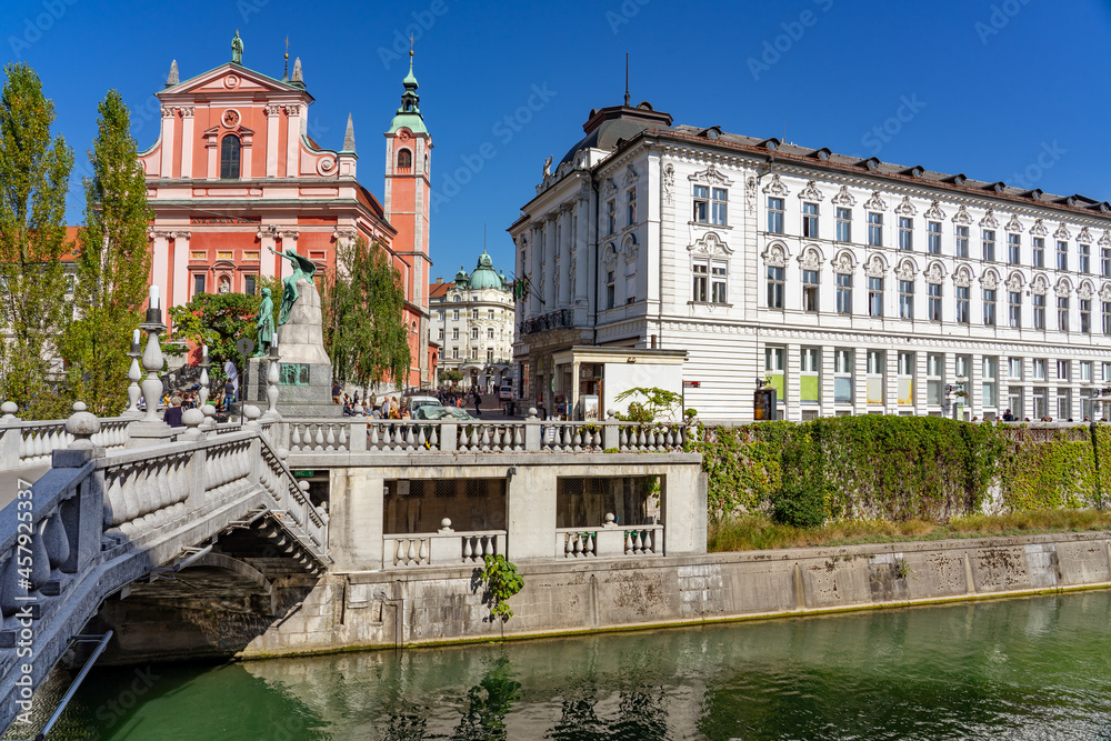 Preseren Square with Tromostovje bridge on Ljubljanica river with Cerkev Marijinega oznanjenja church Preseren Square with Tromostovje bridge on Ljubljanica river with Cerkev Marijinega oznanjenja church