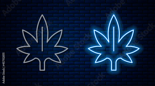 Glowing neon line Medical marijuana or cannabis leaf icon isolated on brick wall background. Hemp symbol. Vector