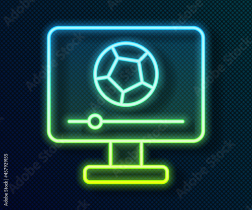 Glowing neon line Football soccer match on TV icon isolated on black background. Football online concept. Vector