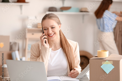 Female business owner proce...