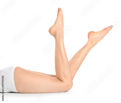 Legs of beautiful woman on white background