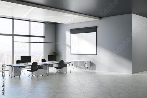 Modern concrete office interior with blank mock up banner on wall, windows, city view, sunlight, equipment and furniture. 3D Rendering.