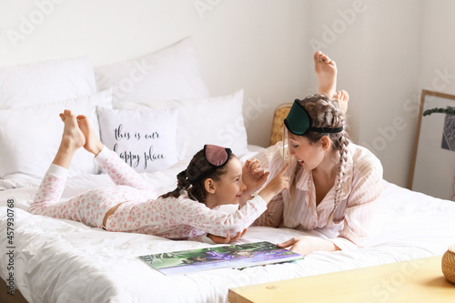 Little girl with her mother...