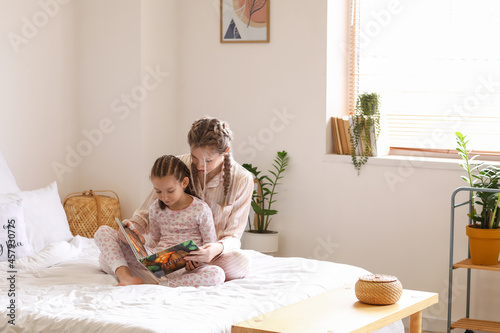 Little girl with her mother...