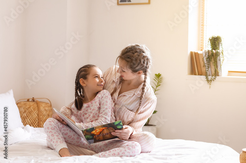 Little girl with her mother...