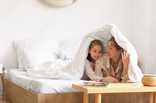 Little girl with her mother...