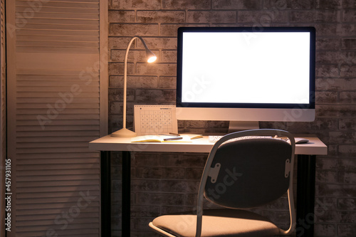 Stylish workplace with mode...
