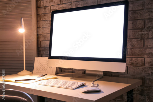 Stylish workplace with mode...