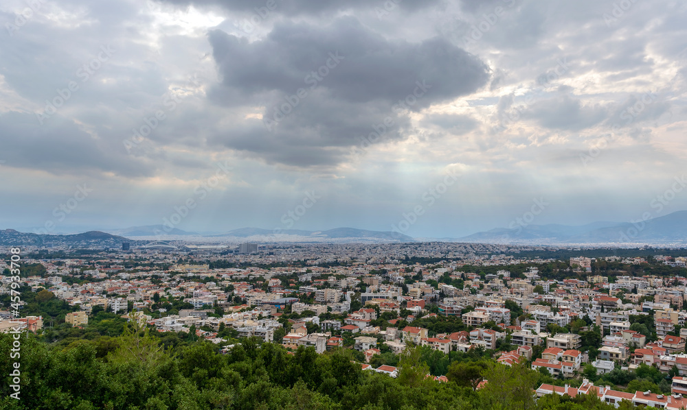 Panoramic view of cloudy Athens, taken shot from Penteli mountain.