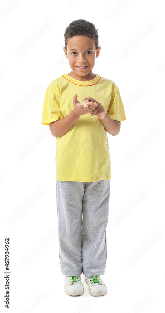 Little African-American boy with snail on white background Little African-American boy with snail on white background