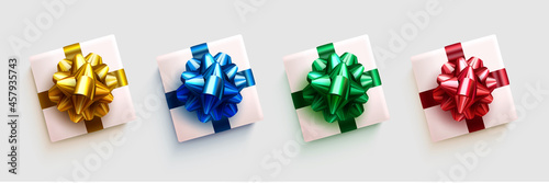 Christmas gift boxes elements vector set. Gifts box with elegant ribbon lasso element for xmas, birthday and holiday season celebration gifts design. Vector illustration.
