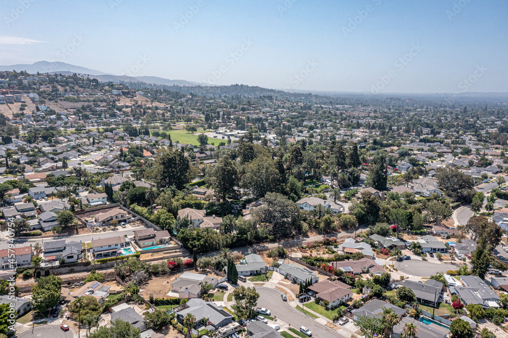 Aerial view of upscale suburban neighborhood during the day