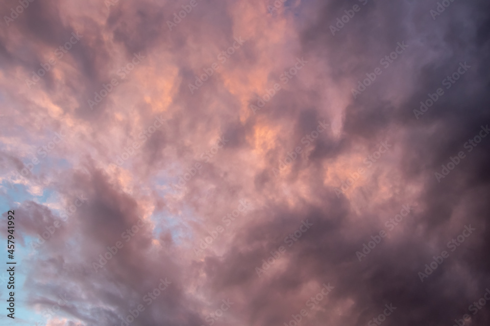 Sunset clouds with a hint of rain in the sky