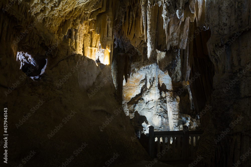 Image of dark cave of Demons in Southern France outdoors.
