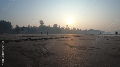 A beautiful time-lapse video of unset at Shrivardhan Beach, India. photo