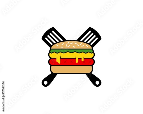 Cross spatula with delicious burger inside