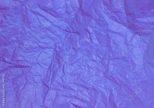 Crumpled purple paper abstract background texture