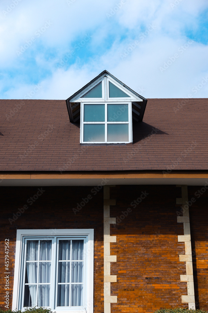 Vintage House window with beautiful cloud background