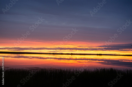 Sunrise over a river in Alaska