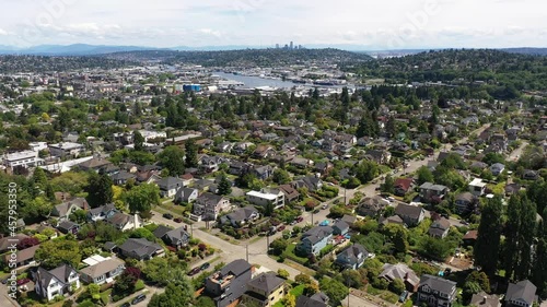 Cinematic 4K aerial drone footage of Sunset Hill, Loyal Heights, Adams, Lawtonwood, Ballard Bridge, near Ballard, Seattle, by Puget Sound with sailboats and yachts photo