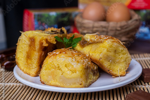 Pineapple bread, the typical food of the city of Tegal, Indonesia, decorated with egg photo