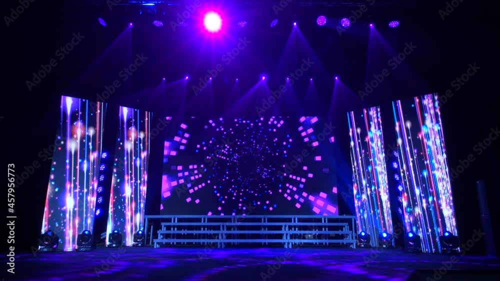 Animation of stage lights frame. Bright shiny stage lights flashing movement entertainment spotlight projectors in the dark, blue soft light spotlight strike on black background.