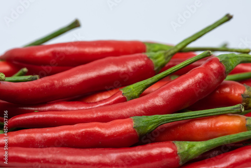 Red hot chili peppers isolated on white background. 