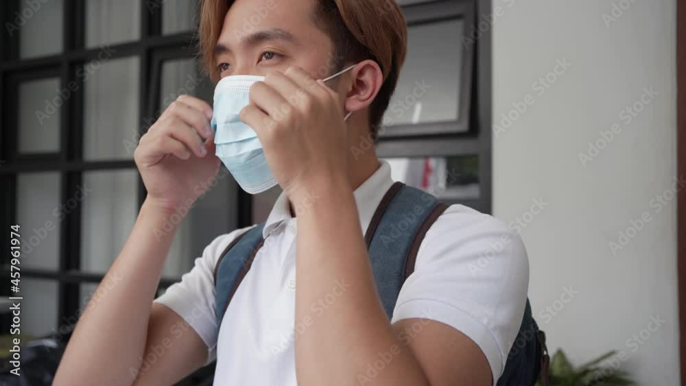 student wearing face mask before going to school or campus student wearing face mask before going to school or campus