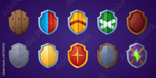 Set of game shields, cartoon fantasy medieval armor of metal and wood. Knight ammo, iron or wooden guard collection, ui design elements, military screens front view isolated vector icons, clipart