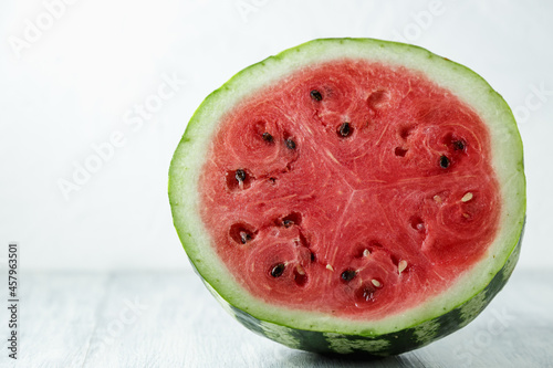 Waterelon, honey watermelon on wooden table background. photo