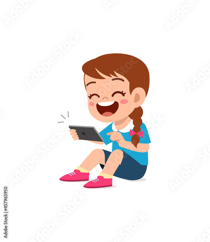 little girl using mobile phone and laugh