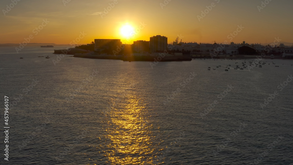 Aerial view over boats docking near Cadiz City at sunset, Spain

Beautiful sunset from spain Cadiz City,drone view, 2021
