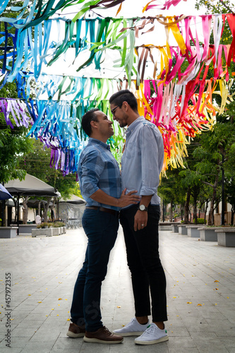 gay couple of latin men in love walking in the city of zapopan jalisco, gay concept