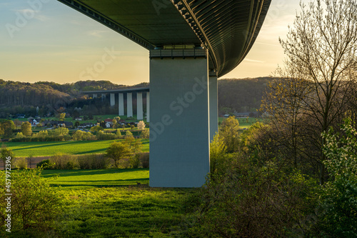 Evening view over the Ruhrtal and the motorway bridge towards towards Mintard in Muelheim an der Ruhr, North Rhine-Westphalia, Germany photo