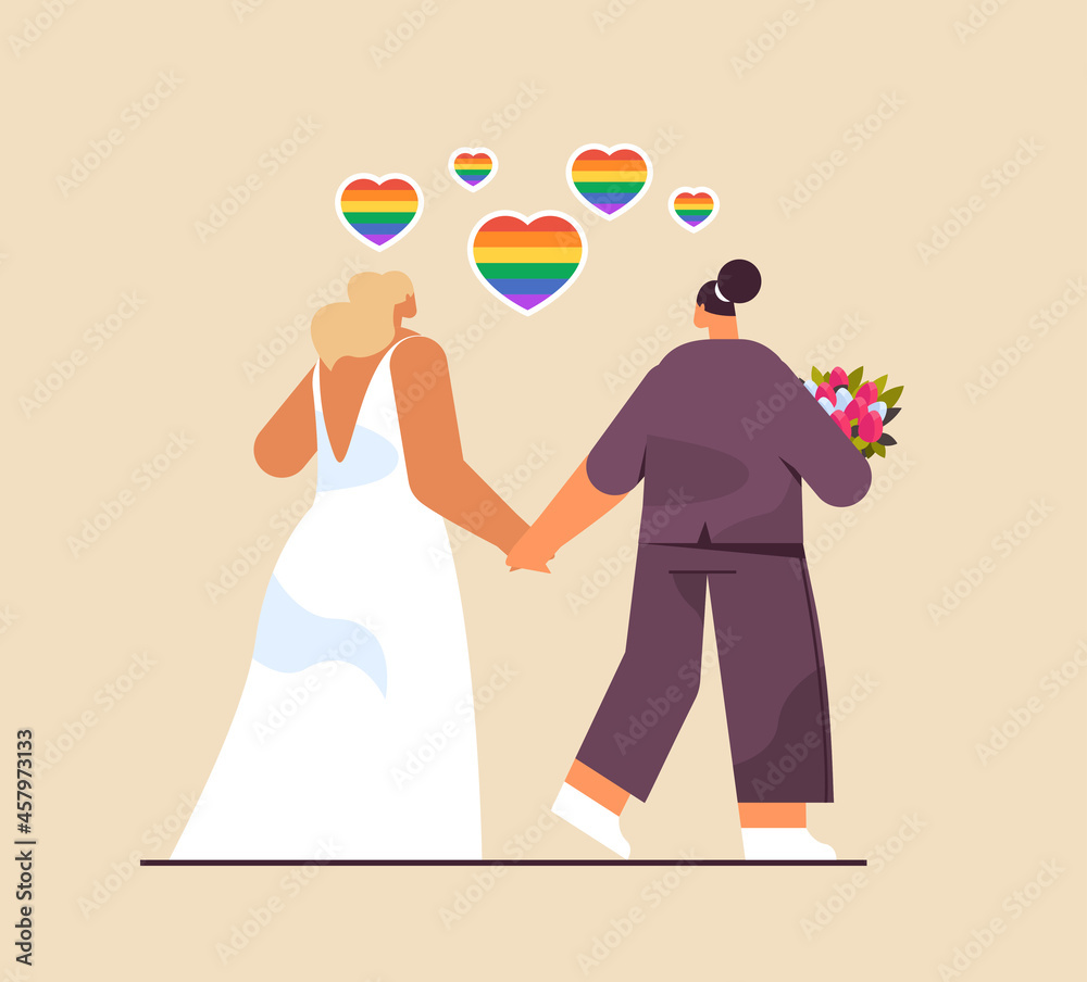 Obraz premium newlywed lesbian couple with flowers standing together transgender love LGBT community wedding celebration concept