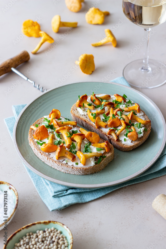 Bruschetta with mushrooms chanterelles and white cheese. Healthy eating. Vegetarian food.