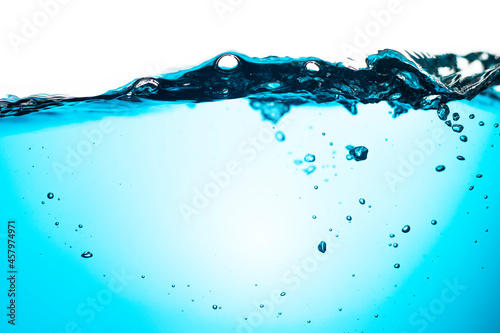 Water Surface with Ripple and Bubbles Float Up on White Background. Water Wave