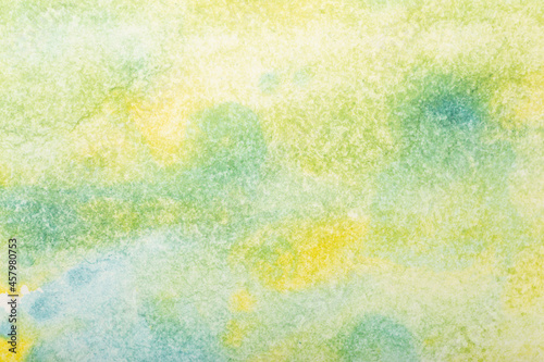 Watercolor background. Colored brush strokes of watercolor paint on white paper.