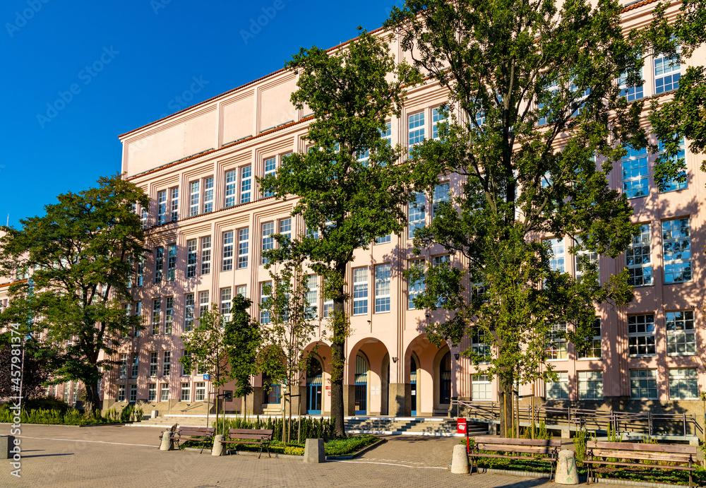 Naklejka premium Warsaw School of Econonics main building at Niepodleglosci avenue and Pole Mokotowskie metro station in Mokotow district of Warsaw, Poland