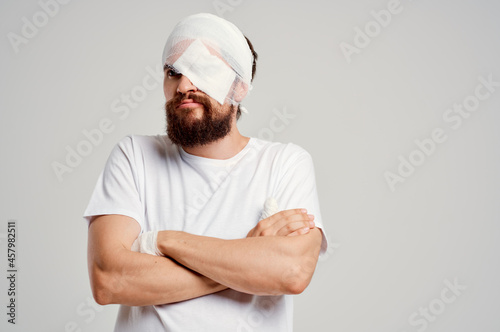 male patient head injury in white t-shirt headache hospital medicine