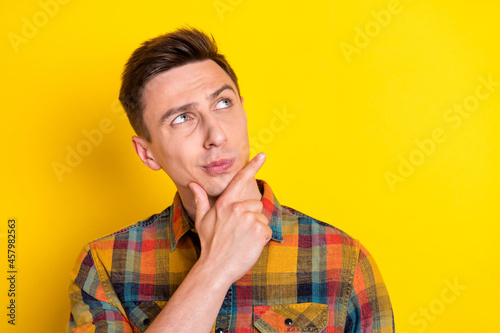 Valokuva Portrait of attractive minded suspicious guy thinking touching chin copy space i