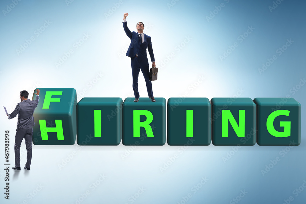 Hiring and firing concept with turning cubes Hiring and firing concept with turning cubes