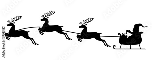 Silhouette Santa flying on deer sleigh
