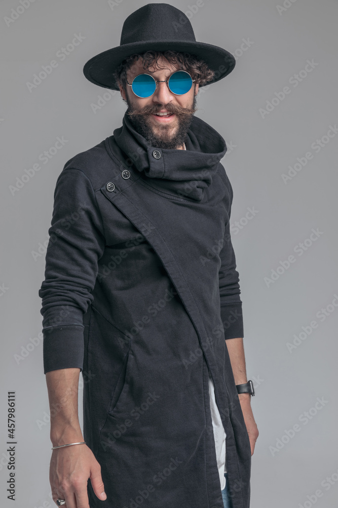 attractive casual man smiling, wearing a hat attractive casual man smiling, wearing a hat