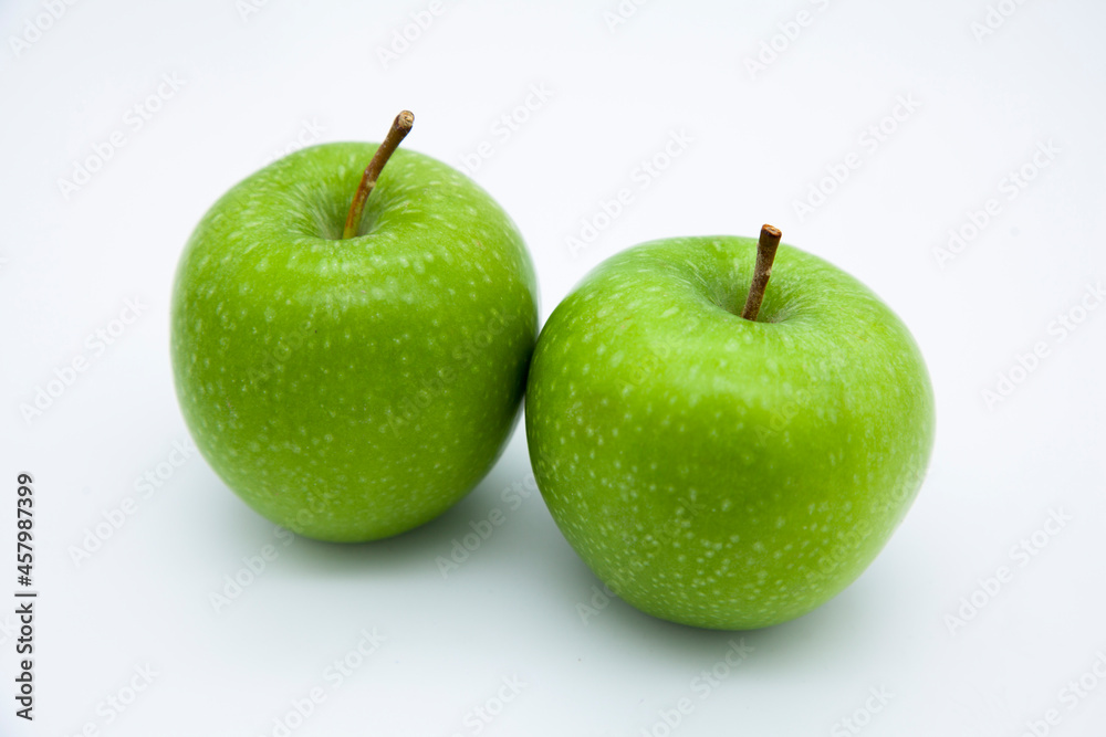Twin green apples. Apples with white spots. Vitamin store green apple. Twin green apples. Apples with white spots. Vitamin store green apple.
