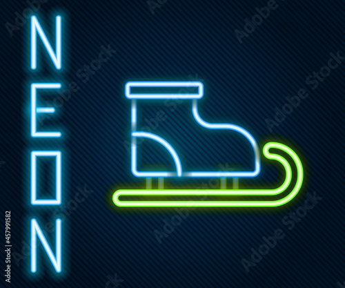 Glowing neon line Figure skates icon isolated on black background. Ice skate shoes icon. Sport boots with blades. Colorful outline concept. Vector