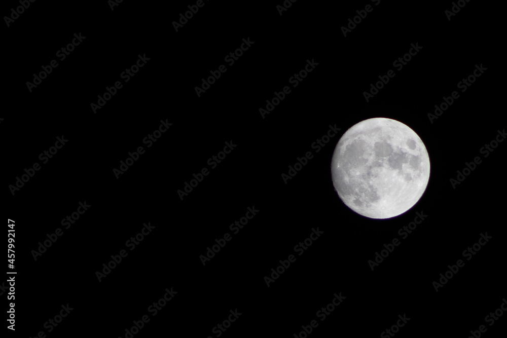 full moon against a black sky background full moon against a black sky background