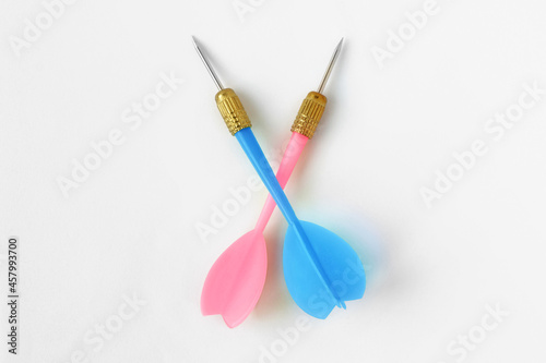 Pink and blue dart together on white background - Concept of gender teamwork