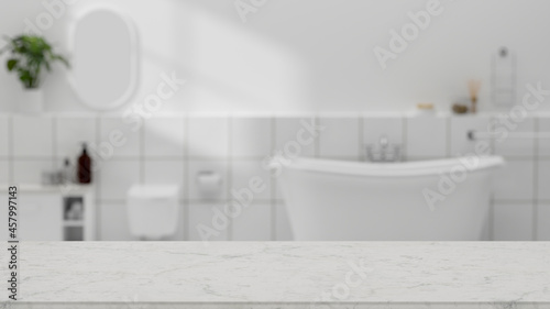 Copy space on marble bathroom tabletop over modern white bathroom interior